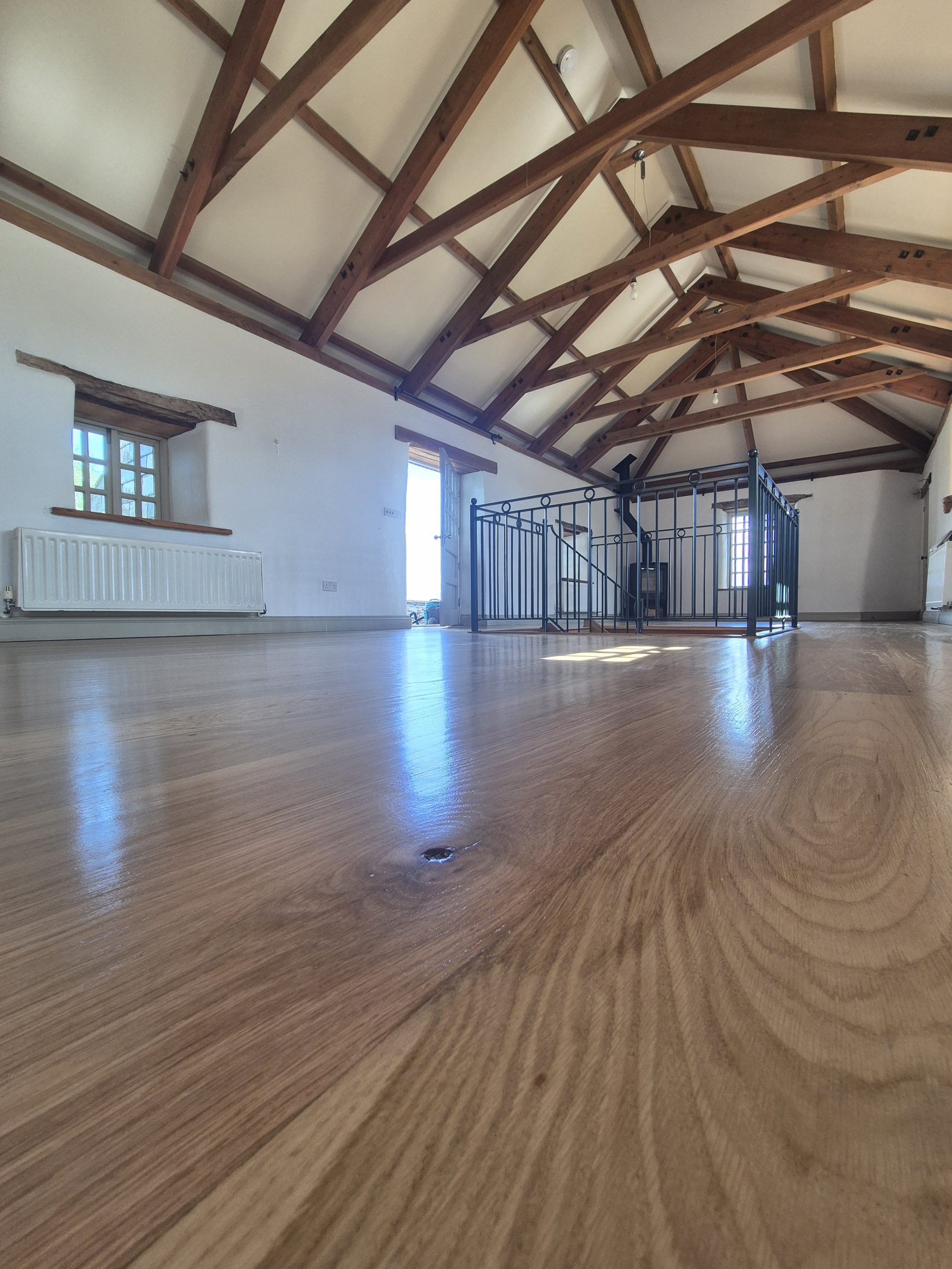 Commercial hardwood floor after professional sanding and sealing