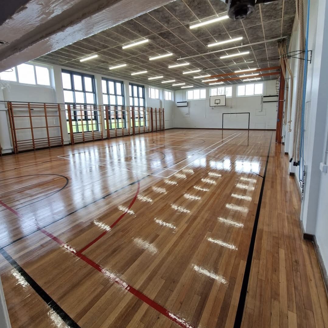 Hardwood sports hall floor sanding service